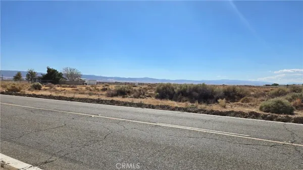 a view of a rural road with a road