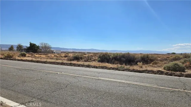 a view of a rural road with a road