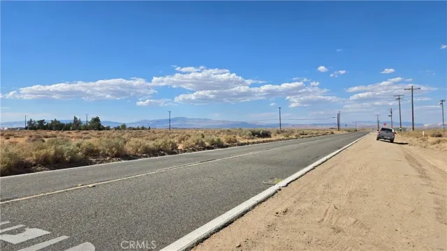 a view of a refrigerator in a kitchen