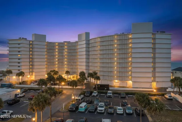 a front view of a building with outdoor space