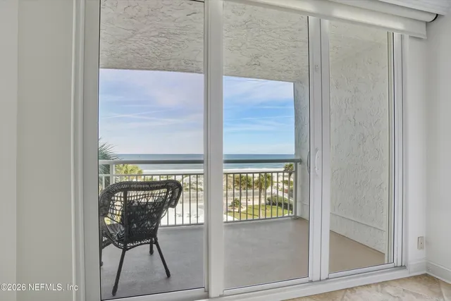 a view of balcony with furniture