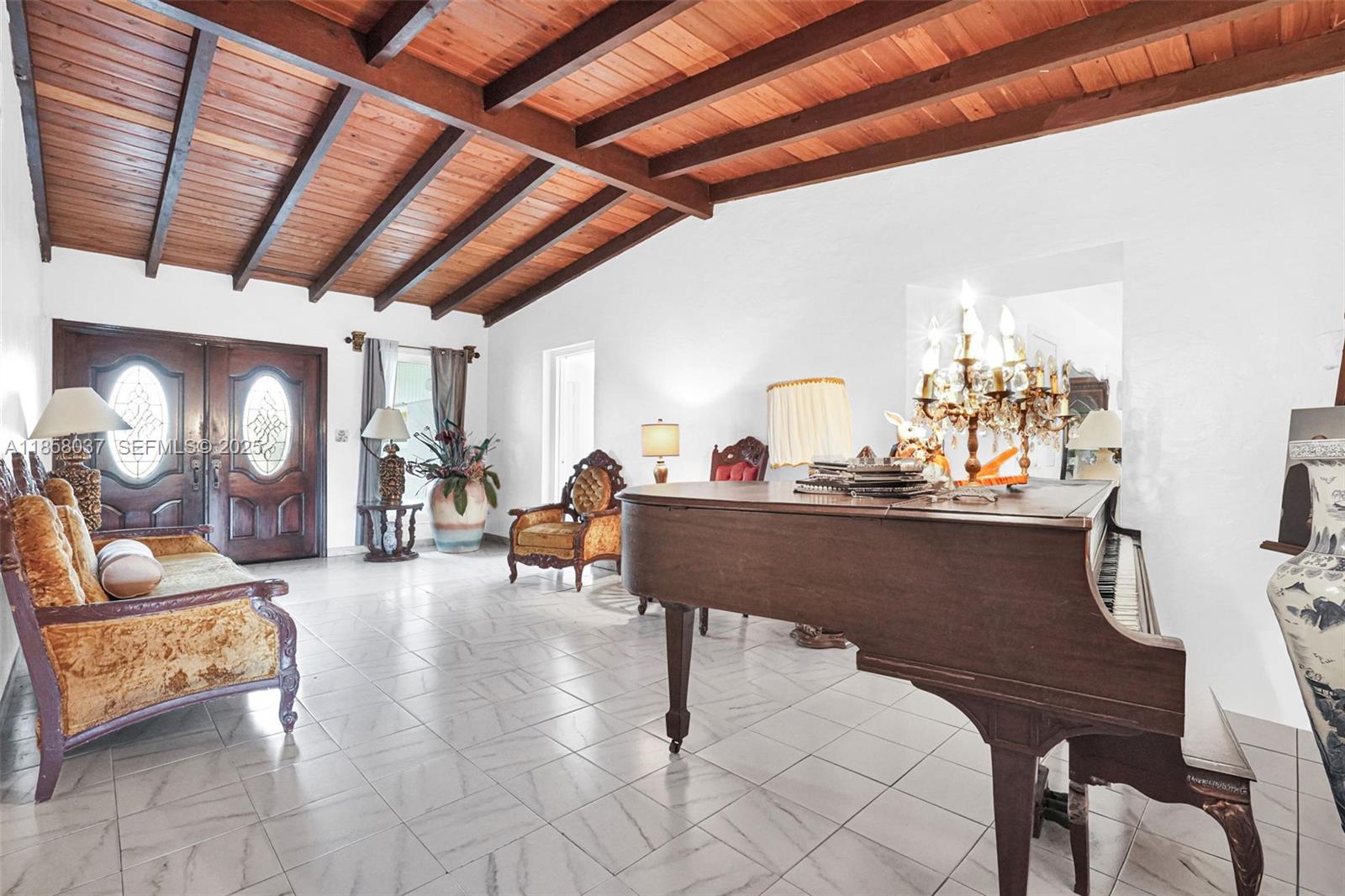 3711 Southwest 87th Avenue Miami, FL 33165 - Photo 17 of 92 a living room with furniture and a wooden floor