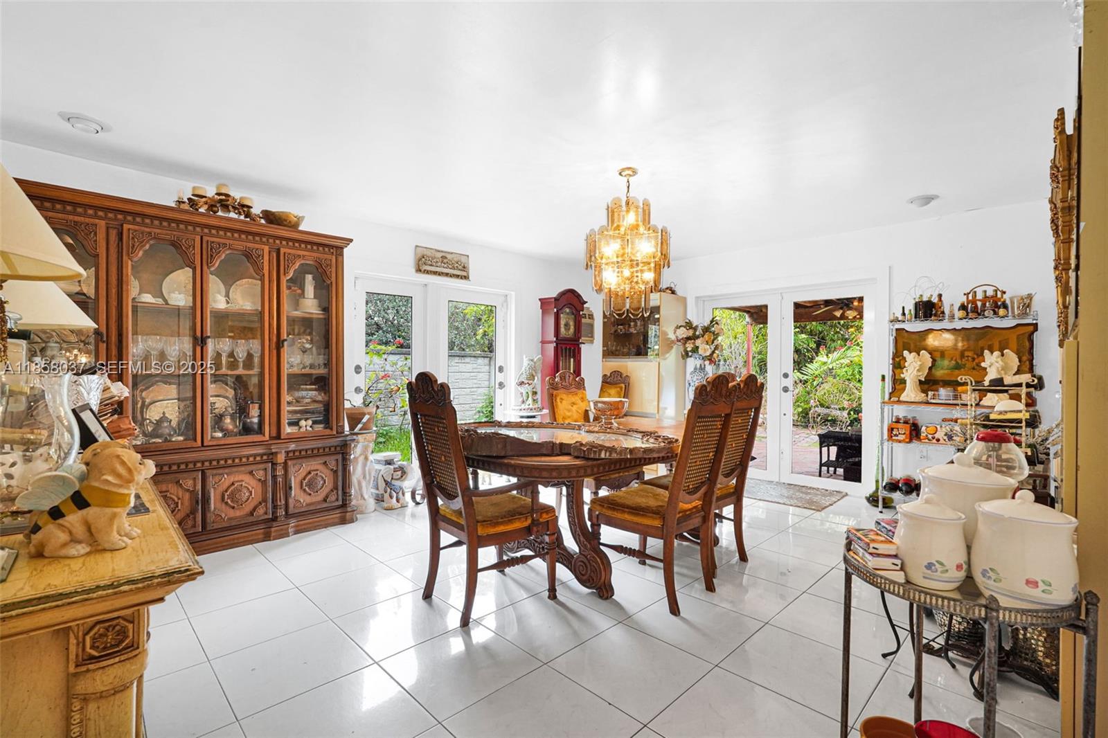 3711 Southwest 87th Avenue Miami, FL 33165 - Photo 18 of 92 a view of a dining room with furniture window and outside view