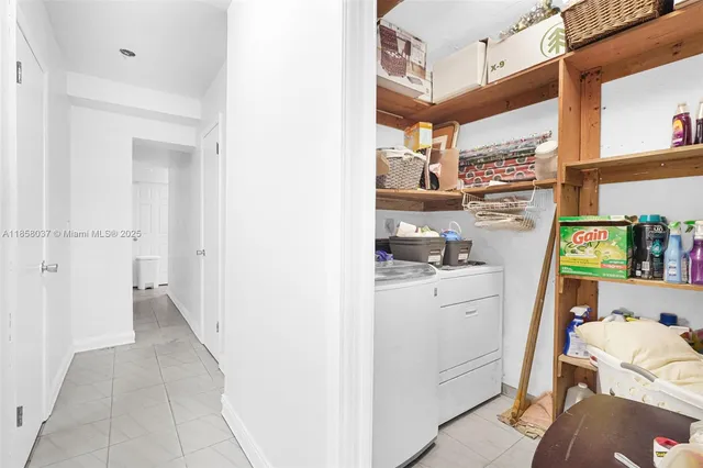 a kitchen with stainless steel appliances granite countertop a stove top oven a sink dishwasher and cabinets with wooden floor