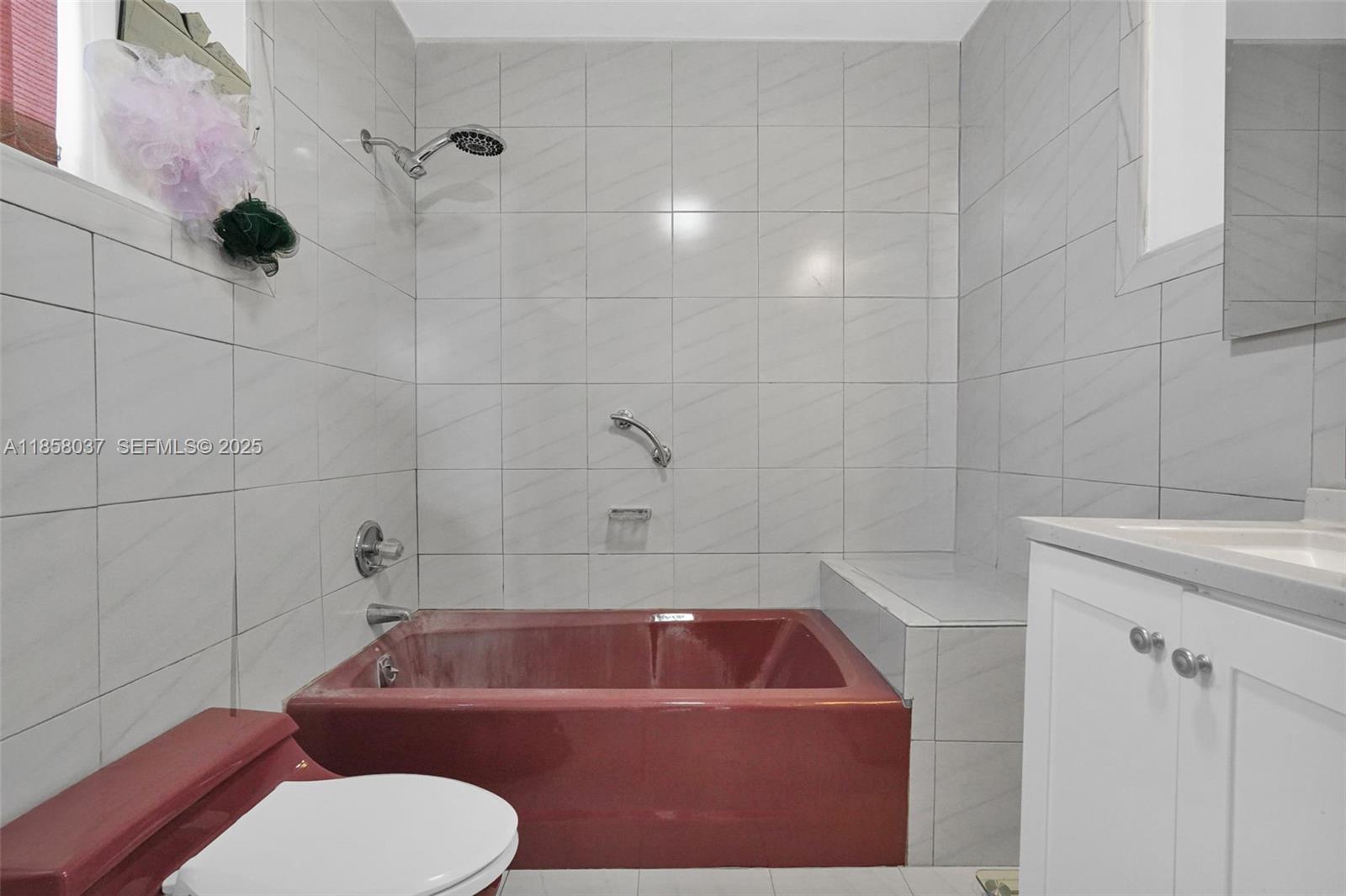 3711 Southwest 87th Avenue Miami, FL 33165 - Photo 29 of 92 a bathroom with a sink a toilet and bathtub