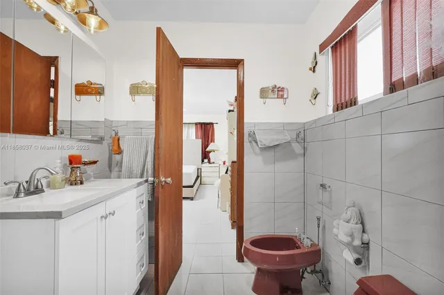 an aerial view of residential houses and outdoor space