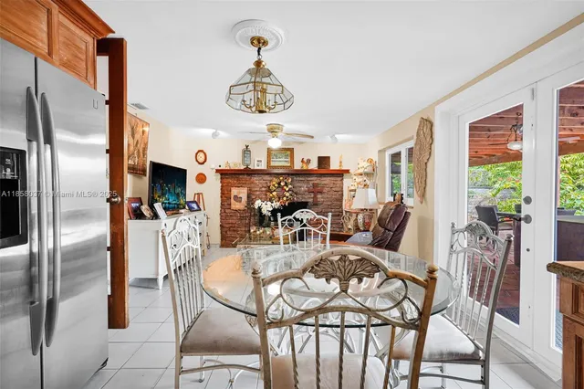 a view of a swimming pool with an outdoor seating
