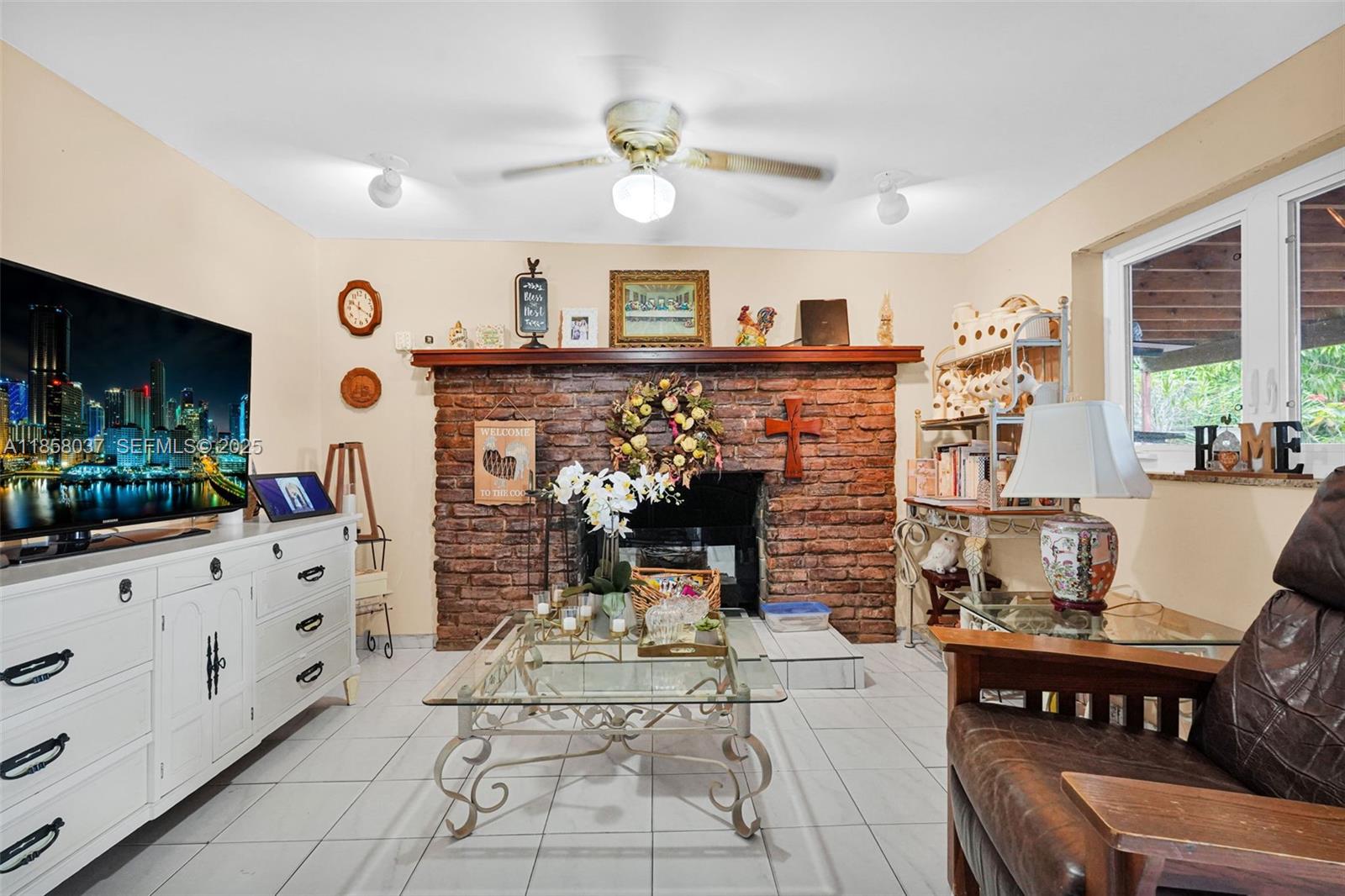 3711 Southwest 87th Avenue Miami, FL 33165 - Photo 41 of 92 a view of a dining room with furniture and chandelier