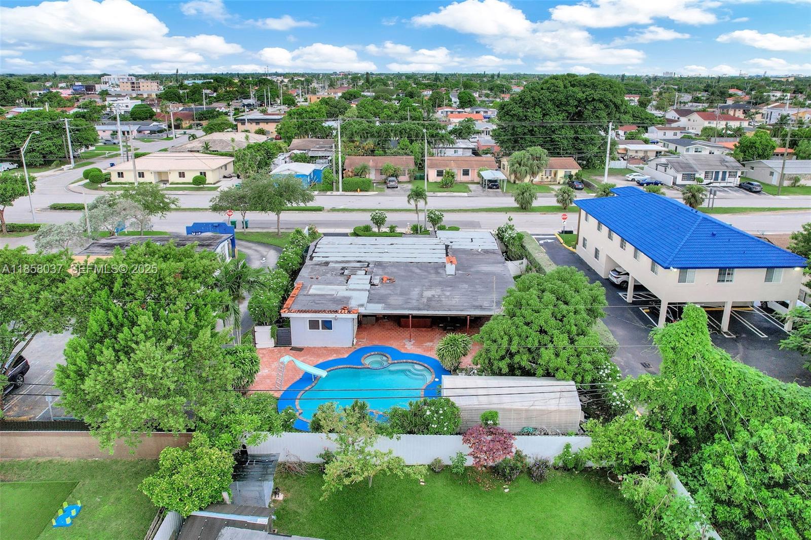 3711 Southwest 87th Avenue Miami, FL 33165 - Photo 57 of 92 an aerial view of residential houses and city view