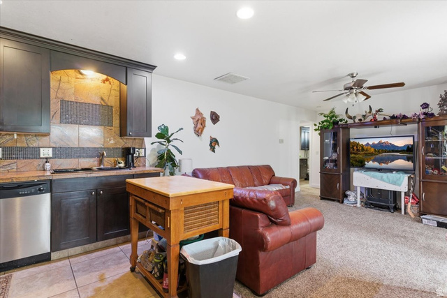 6237 West 4600th Street South Hooper, UT 84315 - Photo 26 of 48 Living area with a ceiling fan and recessed lighting