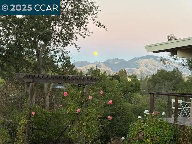 a view of a lake from a balcony