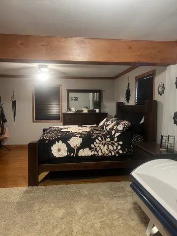 a bed room with furniture