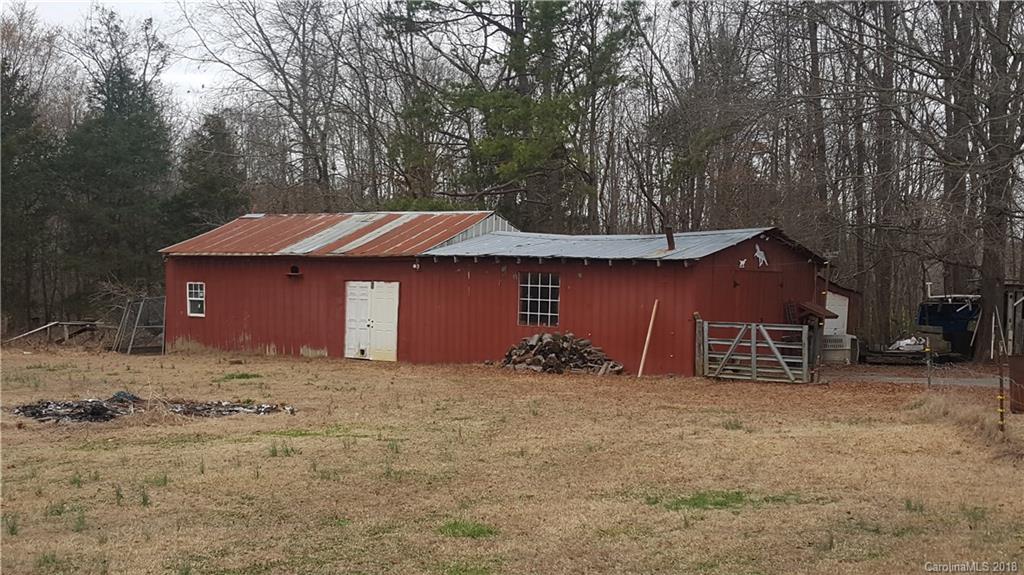 3220 Edwards Road Wingate, NC 28174 - Photo 17 of 21 a front view of a house with a yard