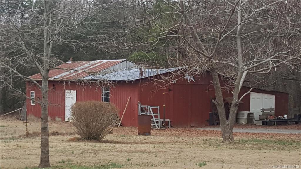 3220 Edwards Road Wingate, NC 28174 - Photo 18 of 21 a view of a house with a yard