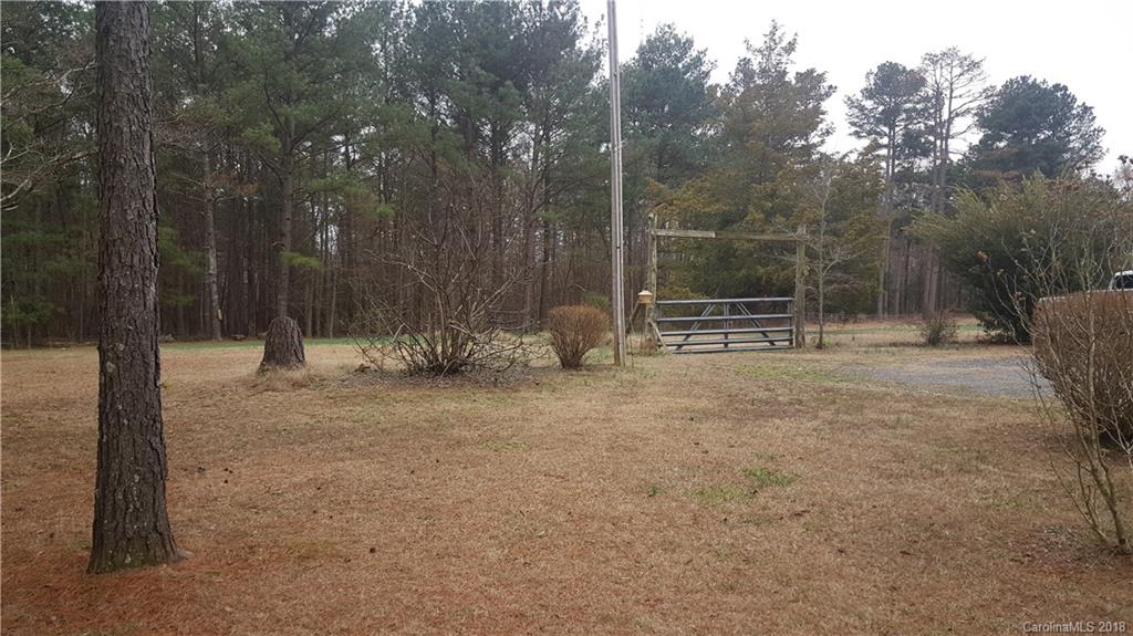 3220 Edwards Road Wingate, NC 28174 - Photo 19 of 21 a view of outdoor space with trees