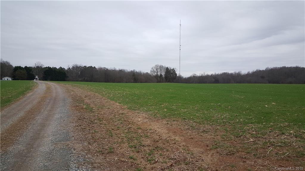 3220 Edwards Road Wingate, NC 28174 - Photo 21 of 21 a view of a field with trees in the background
