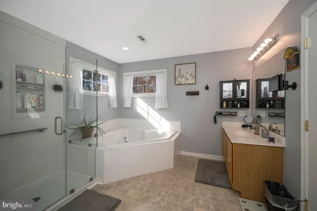 a white bath tub sitting in a room