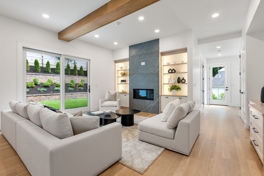 91 Oldham Road Newton, MA 02465 - Photo 14 of 38 a living room with furniture and a large window