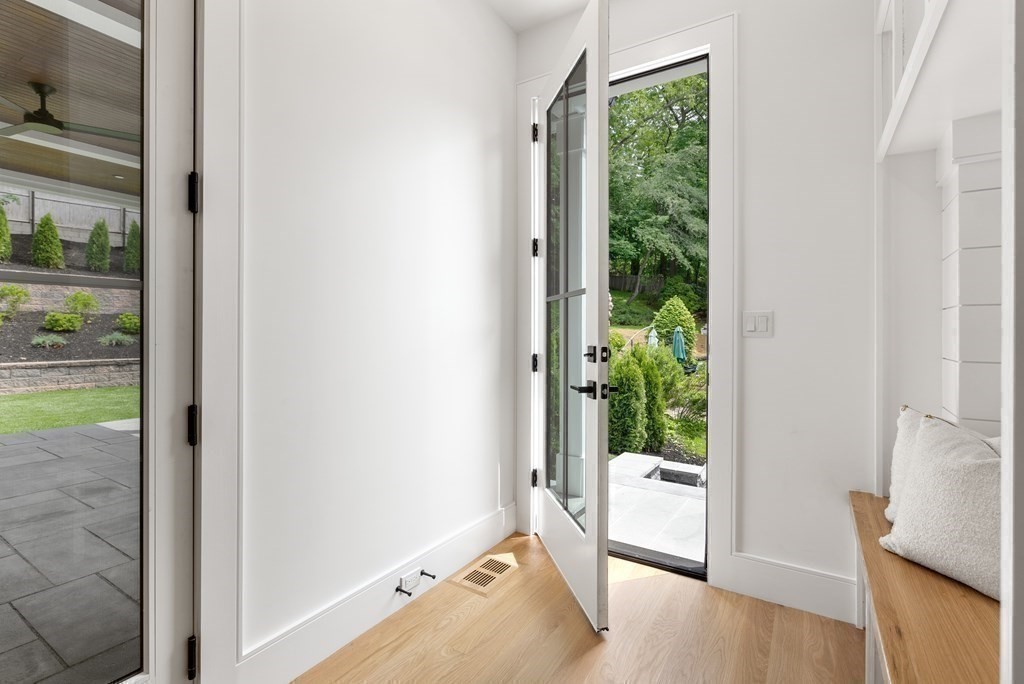 91 Oldham Road Newton, MA 02465 - Photo 16 of 38 a view of a porch with a floor to ceiling window