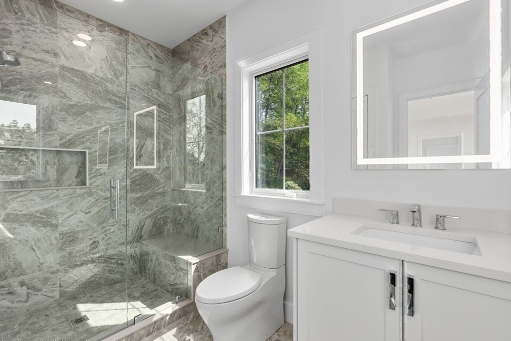 91 Oldham Road Newton, MA 02465 - Photo 24 of 38 a bathroom with a sink toilet and shower