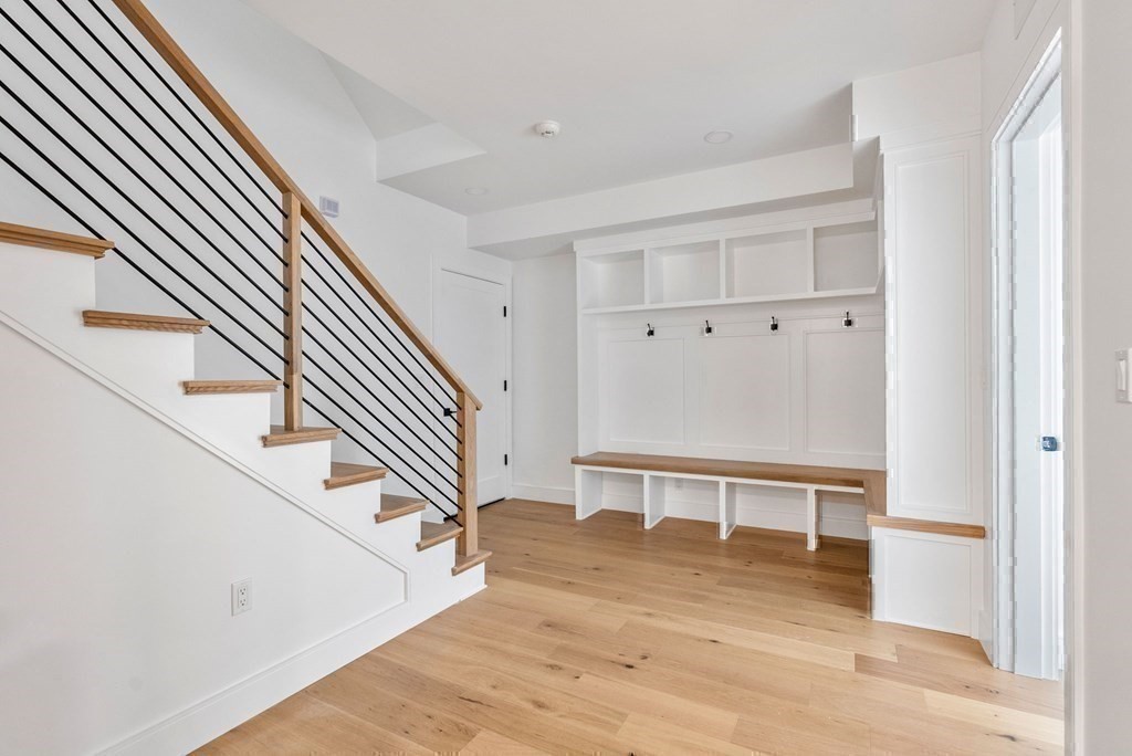 91 Oldham Road Newton, MA 02465 - Photo 26 of 38 a view of entryway with wooden floor