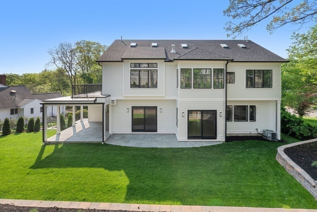 91 Oldham Road Newton, MA 02465 - Photo 28 of 38 a view of house with a yard