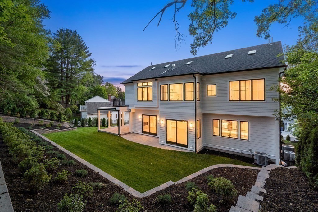91 Oldham Road Newton, MA 02465 - Photo 34 of 38 a front view of a house with a yard