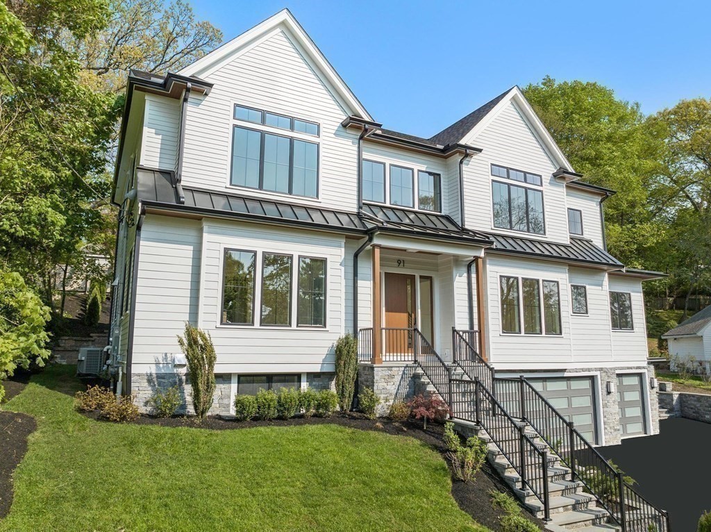 91 Oldham Road Newton, MA 02465 - Photo 35 of 38 a front view of a house with a yard