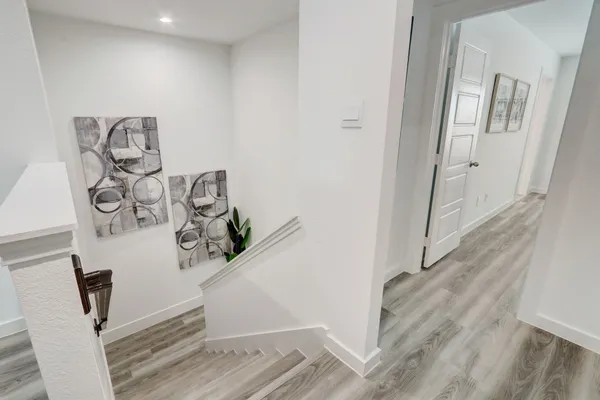 a view of entryway with wooden floor