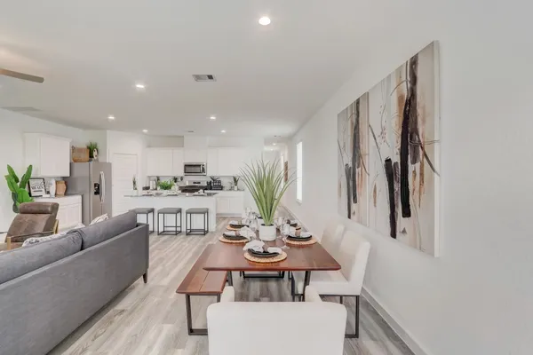 a view of a dining room with furniture