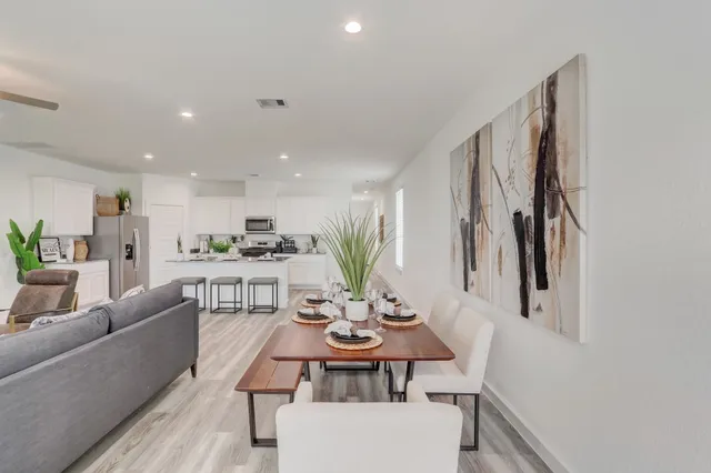 a view of a dining room with furniture