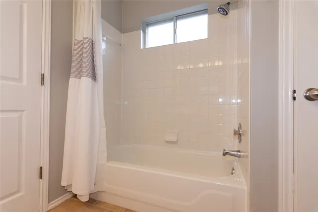 a bathroom with a bathtub