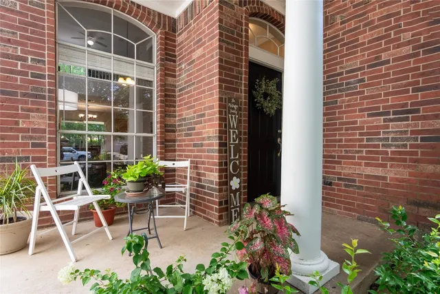 a bench sitting in front of a building