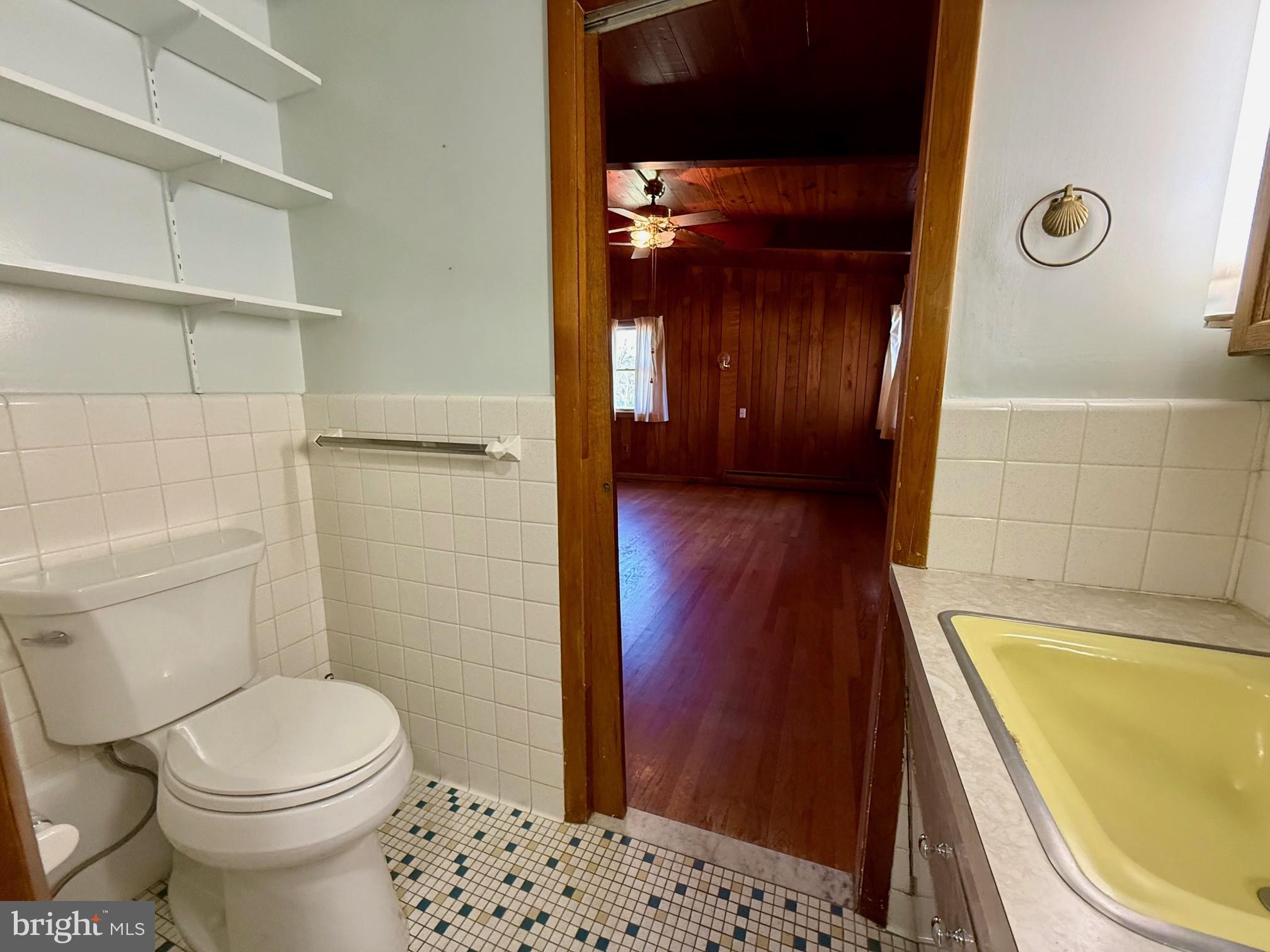48607 Deep Cove Lane Ridge, MD 20680 - Photo 32 of 47 a bathroom with a toilet and a shower