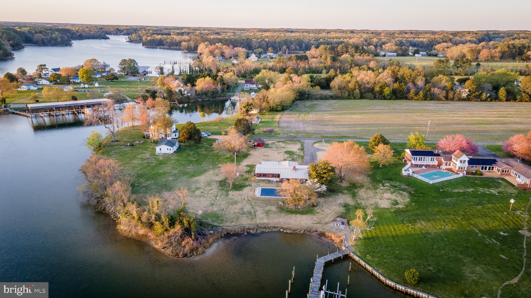 48607 Deep Cove Lane Ridge, MD 20680 - Photo 7 of 47 an aerial view of a house with a ocean view