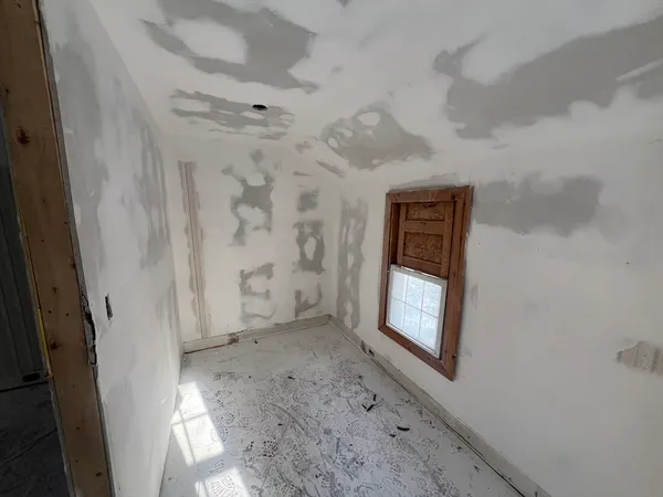 a view of a park with large trees