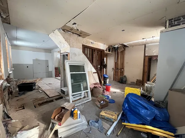 a room with furniture and gym equipment