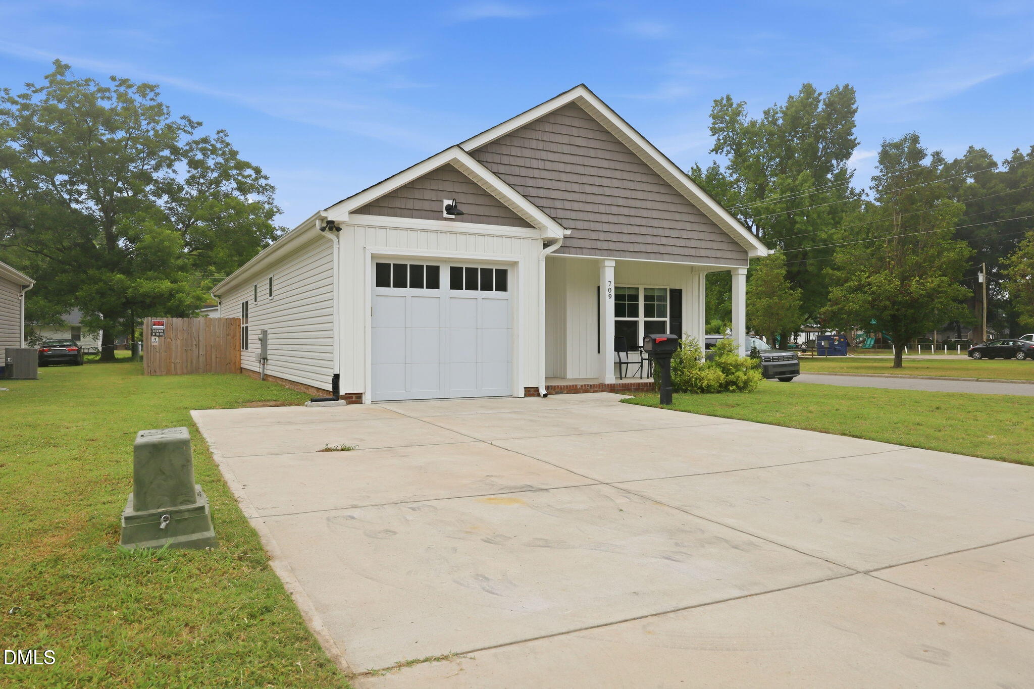 709 South Pollock Street Selma, NC 27576 - Photo 2 of 30 a view of outdoor space yard and house