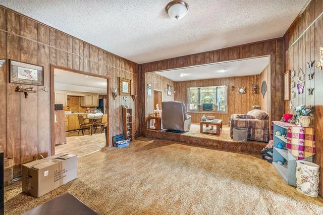 a view of a bedroom with gym equipment