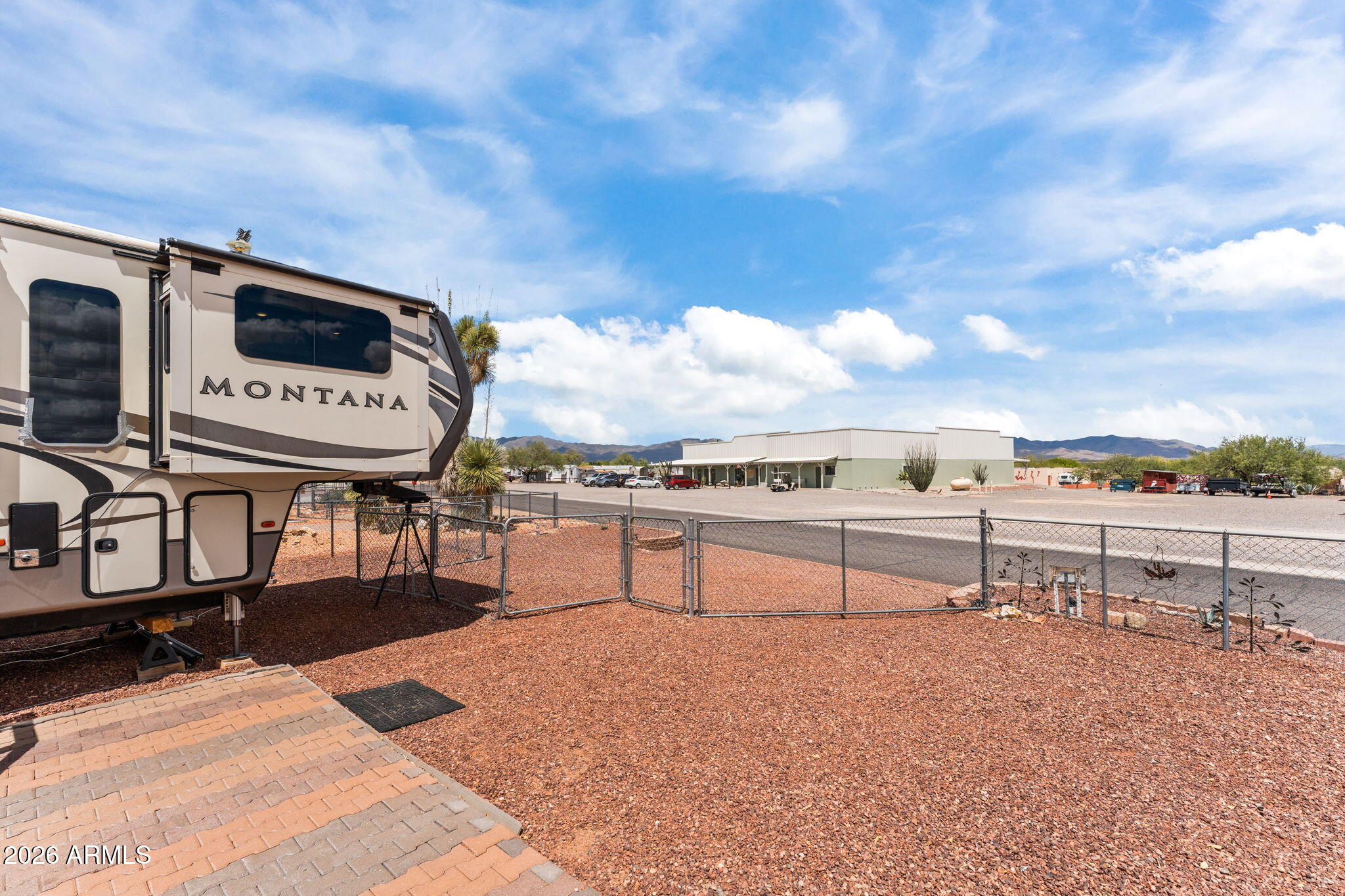 30770 South Pioneer Pass Road, Unit 393 Congress, AZ 85332 - Photo 18 of 23 a view of a terrace with sitting area