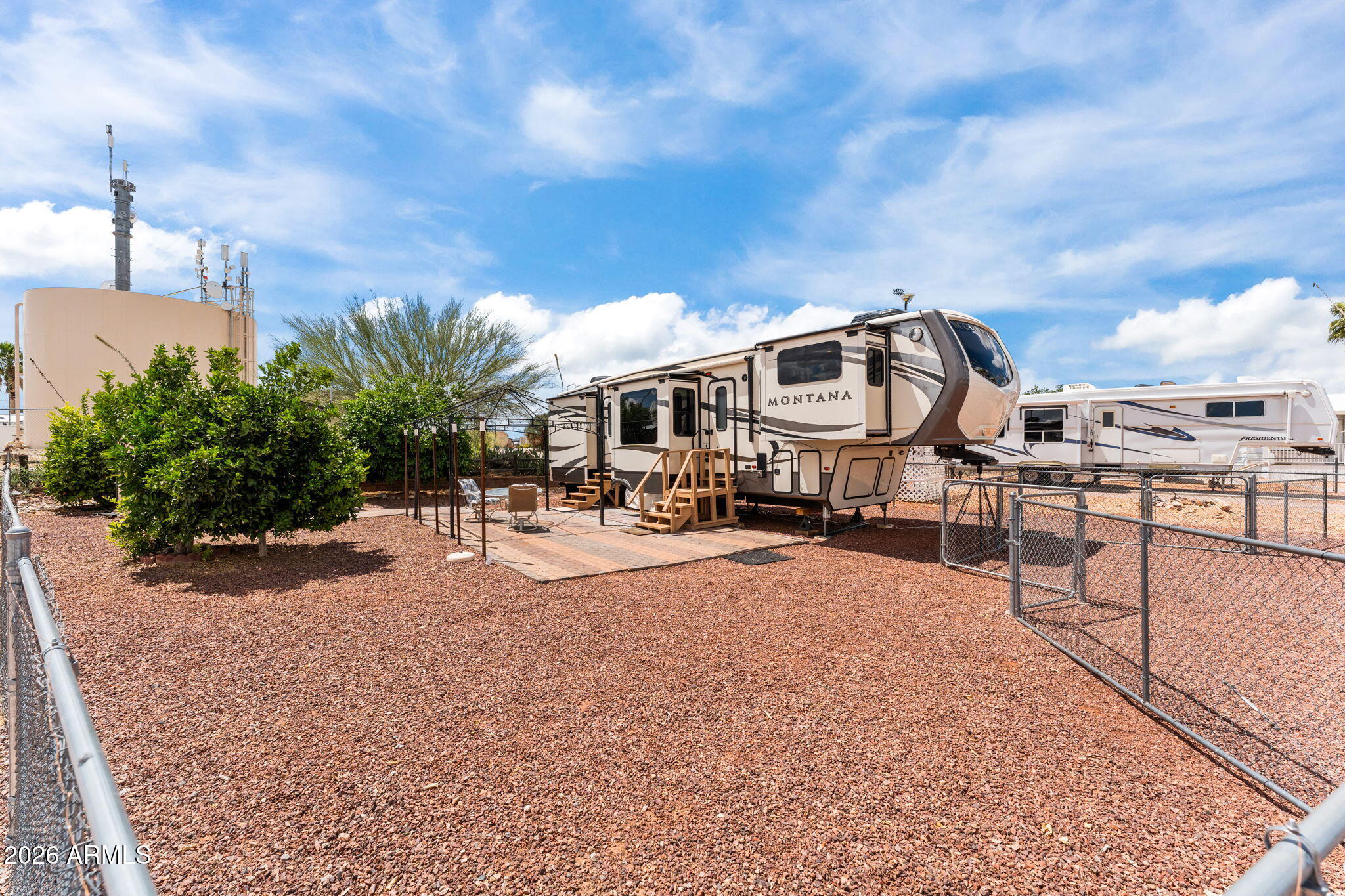 30770 South Pioneer Pass Road, Unit 393 Congress, AZ 85332 - Photo 20 of 23 a view of a large building with a yard