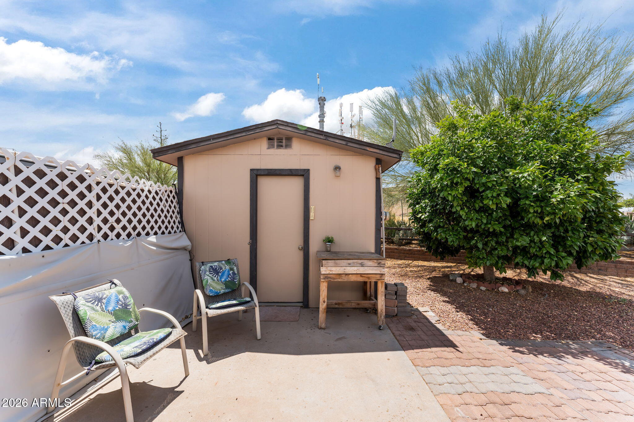 30770 South Pioneer Pass Road, Unit 393 Congress, AZ 85332 - Photo 4 of 23 a front view of a house with garden