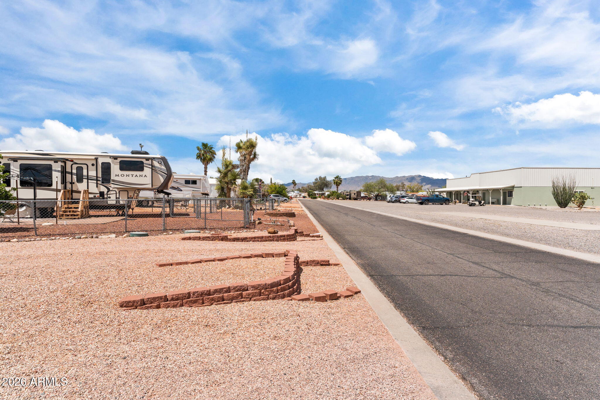 30770 South Pioneer Pass Road, Unit 393 Congress, AZ 85332 - Photo 5 of 23 a view of a terrace with yard