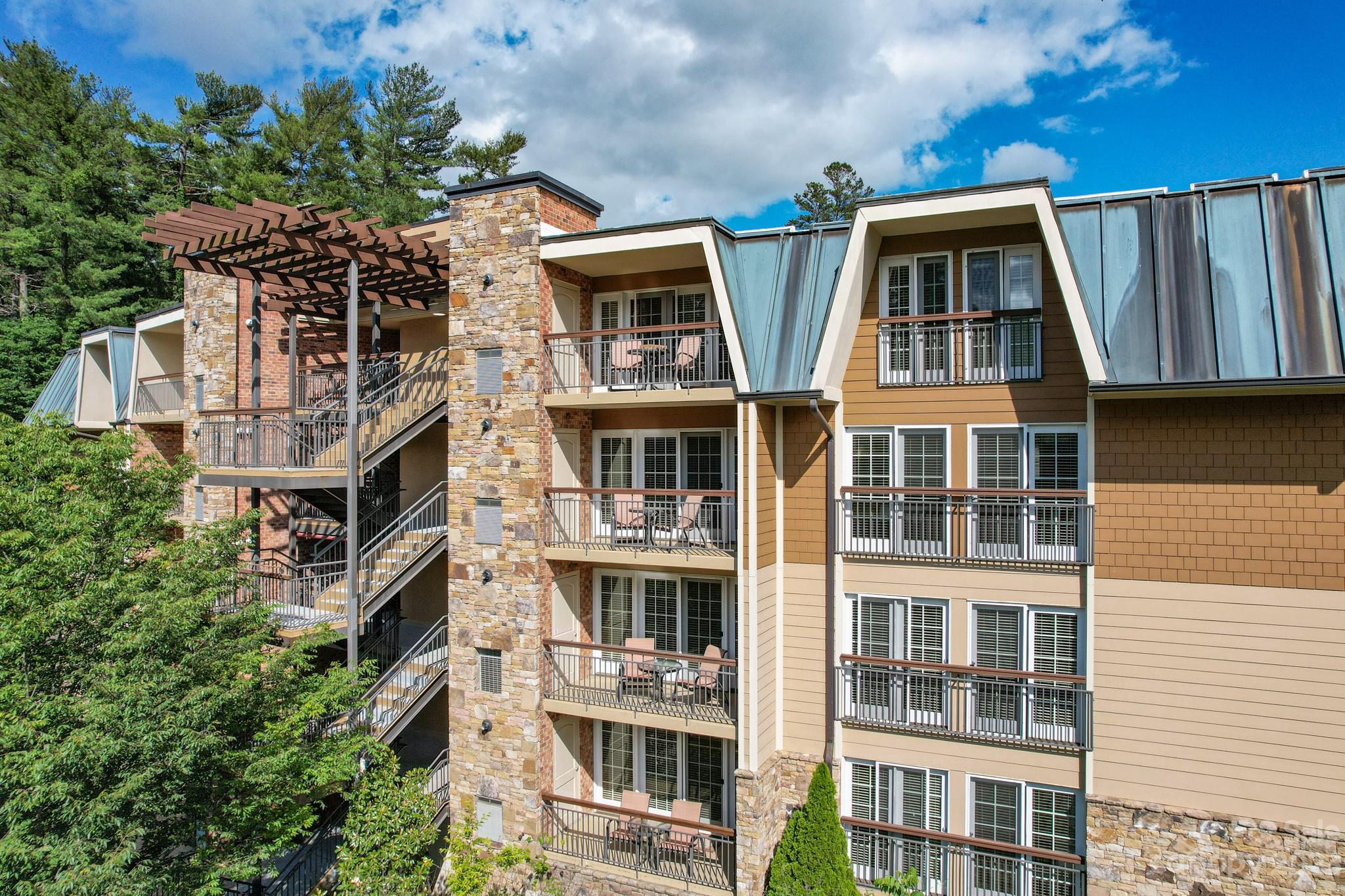 a front view of multi story residential apartment building