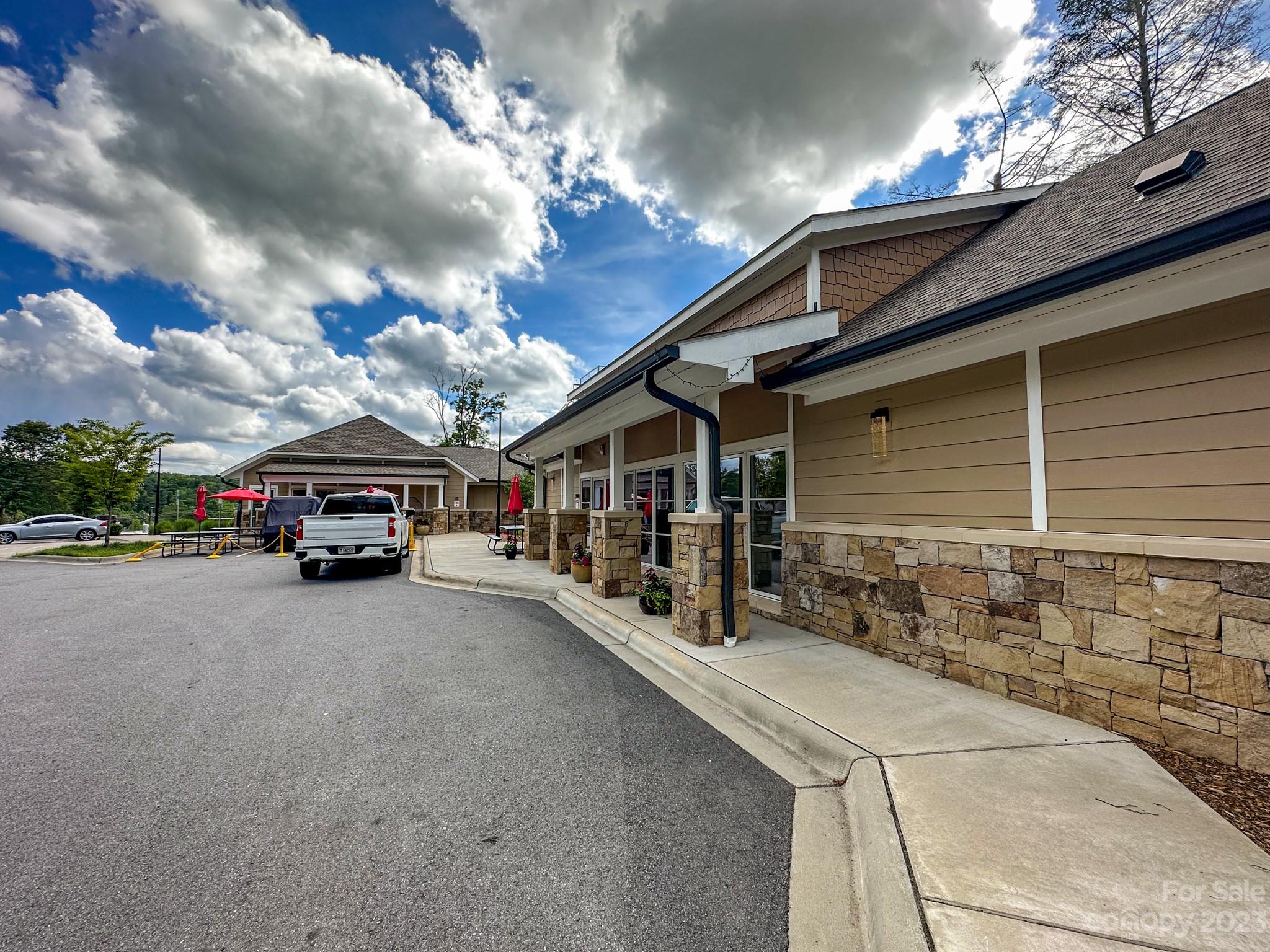 310 Bowling Park Road Asheville, NC 28803 - Photo 29 of 31 a view of a car park in front of house