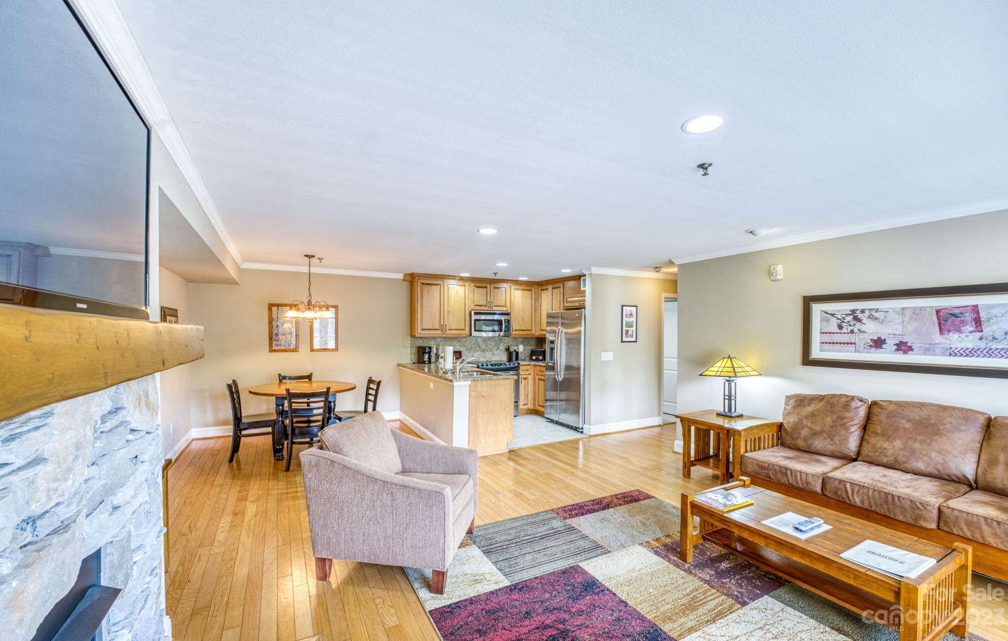 310 Bowling Park Road Asheville, NC 28803 - Photo 6 of 31 a living room with furniture and wooden floor