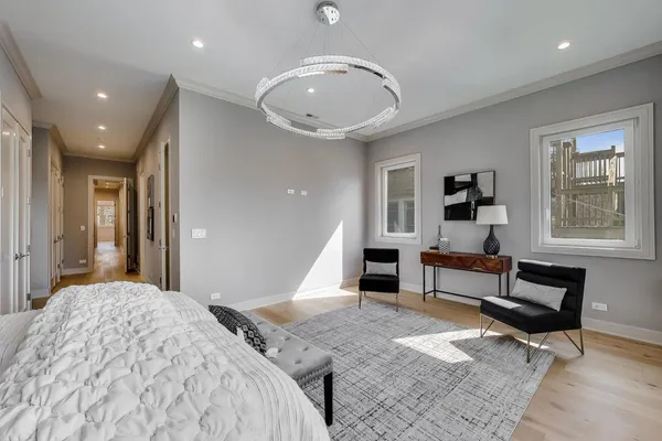 a bed room with a bed and furniture