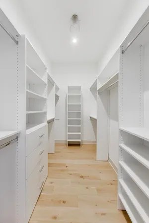 a view of an empty walk in closet