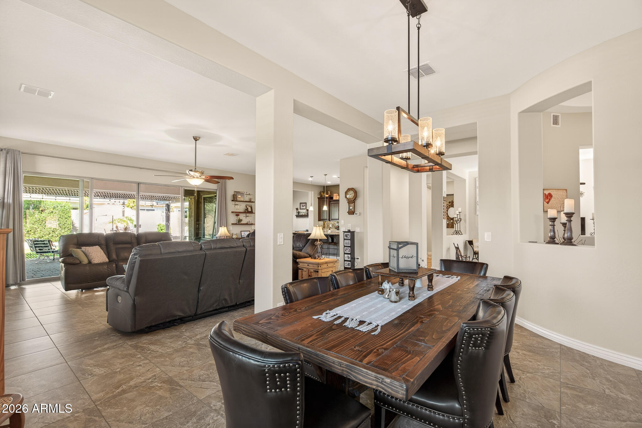 18398 West Rimrock Street Surprise, AZ 85388 - Photo 11 of 65 a dining room with furniture and window