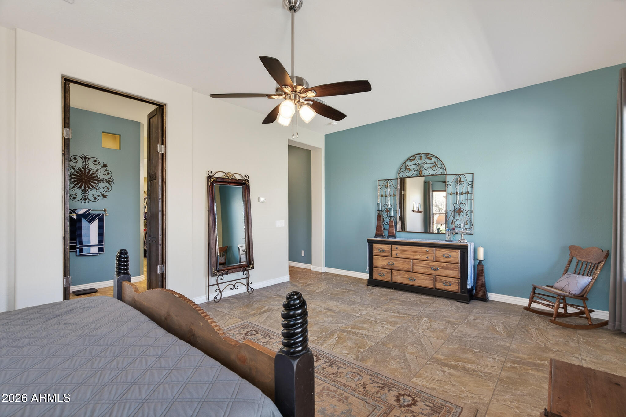 18398 West Rimrock Street Surprise, AZ 85388 - Photo 20 of 65 a bedroom with a bed and a dresser